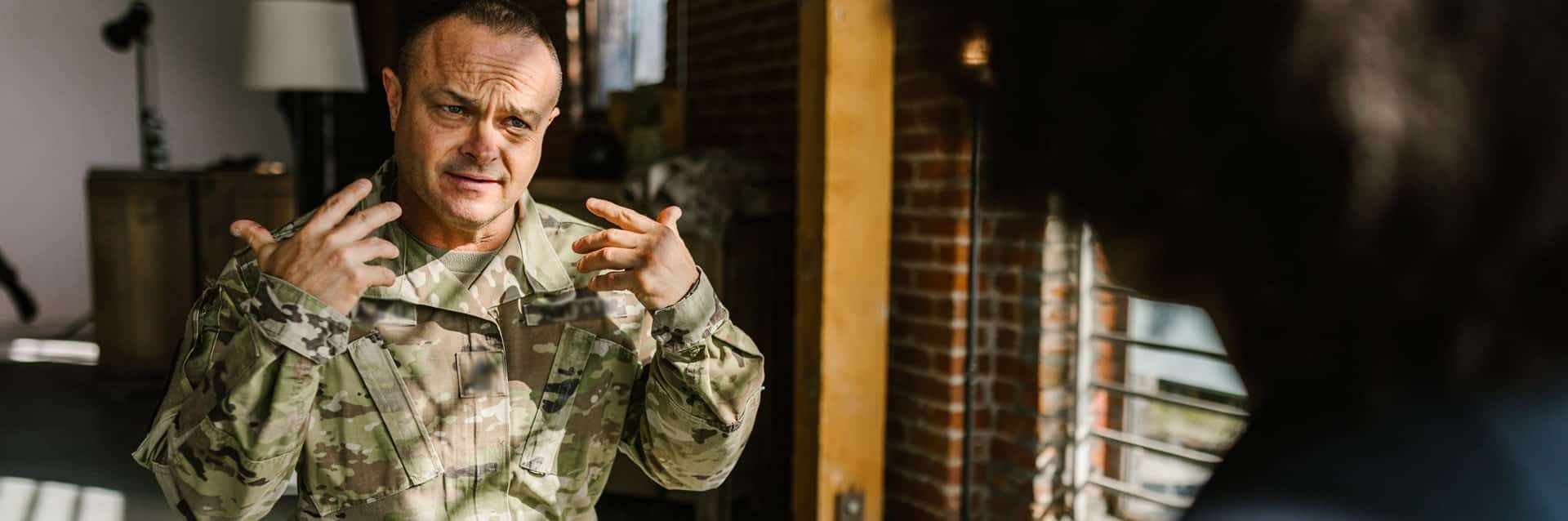 A military man participating in trauma-informed therapy. A military man participating in trauma-informed therapy.