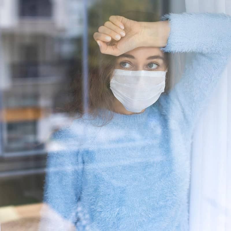 A woman with an intense fear of germs who could greatly benefit from anxiety therapy.