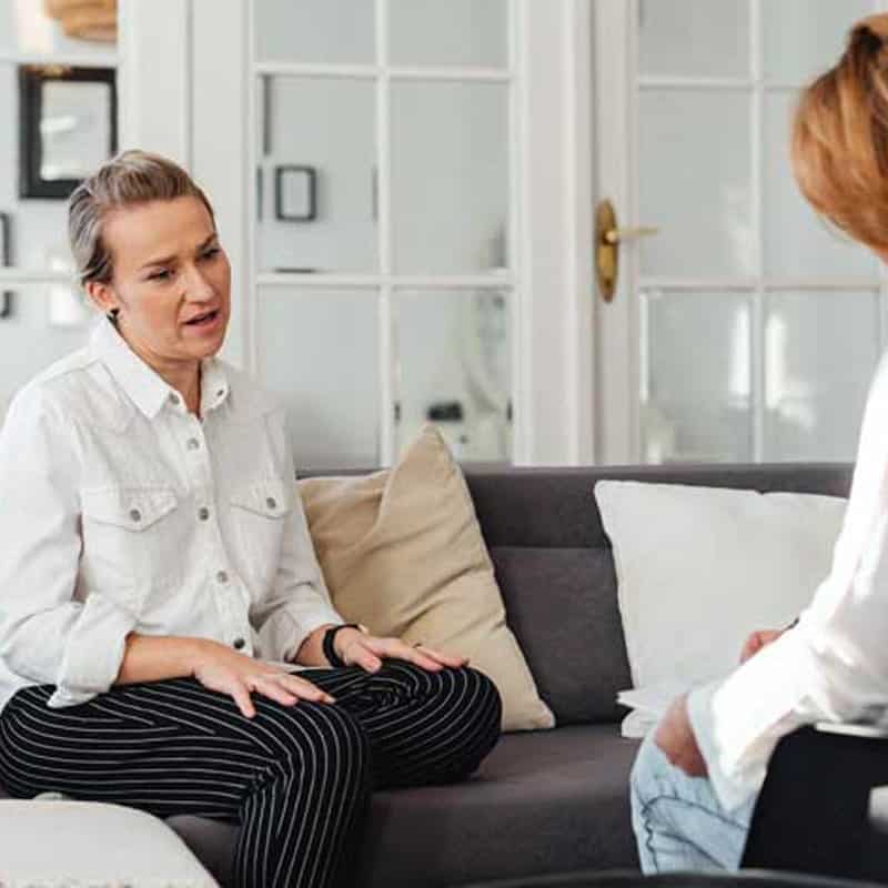 A woman benefiting from individual counselling support.