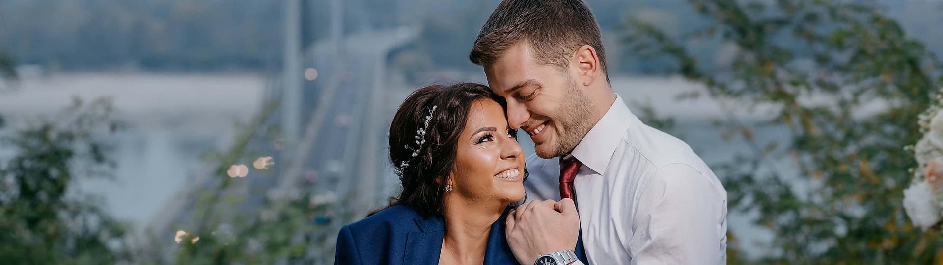 Smiling couple embracing outdoors, representing a positive couples counselling success rate and the potential for renewed connection through therapy.