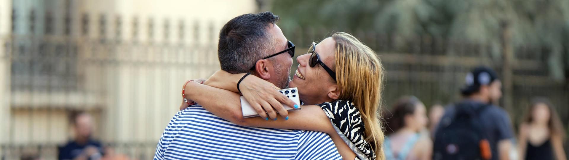 Couple sharing a joyful embrace, symbolizing how couples therapy can help save a relationship with therapy by fostering connection and understanding.